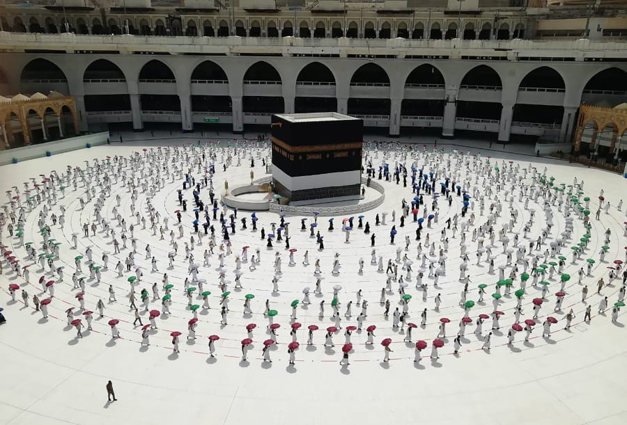 Hundreds of Muslim pilgrims circle the Kaaba, the cubic building at the Grand Mosque, as they observe social distancing to protect themselves against the coronavirus, in the Muslim holy city of Mecca, Saudi Arabia, Wednesday, July 29, 2020 During the first rites of hajj, Muslims circle the Kaaba counter-clockwise seven times while reciting supplications to God, then walk between two hills where Ibrahim&#039;s wife, Hagar, is believed to have run as she searched for water for her dying son before God brought forth a well that runs to this day.