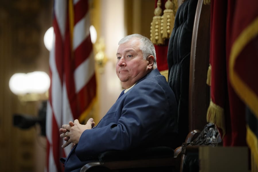 This Wednesday, Oct. 30, 2019 file photo shows Ohio State Representative Larry Householder (R), of District 72, stands at the head of a legislative session as Speaker of the House, in Columbus. FBI agents were at the farm of Householder on Tuesday morning, hours ahead of a planned announcement of a $60 million bribe investigation by federal prosecutors.