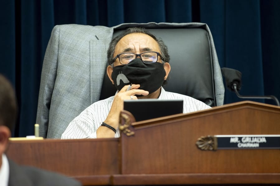 FILE - In this June 29, 2020 file photo, Committee Chairman Rep. Raul Grijalva, D-Ariz., listens on Capitol Hill in Washington, during the House Natural Resources Committee hearing.  A bipartisan bill that would spend nearly $3 billion on conservation projects, outdoor recreation and maintenance of national parks and other public lands is on its way to the president&#039;s desk after winning final legislative approval. Supporters say the measure, known as the Great American Outdoors Act, would be the most significant conservation legislation enacted in nearly 50 years.