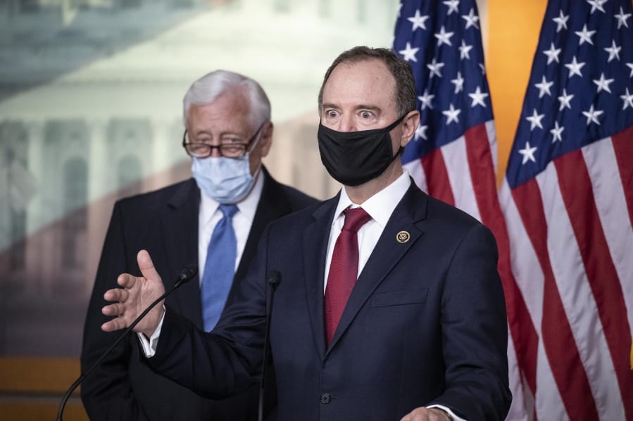 Rep. Adam Schiff, D-Calif., Chairman of the House Intelligence Committee, right, speaks accompanied by House Majority Leader Steny Hoyer of Md., during a news conference on Capitol Hill, after a meeting at the White House, Tuesday, June 30, 2020 in Washington.