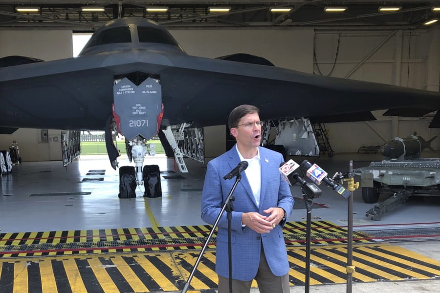 Defense Secretary Mark Esper speaks at Whiteman Air Force Base, Wednesday, July, 22, 2020  in Johnson County, Missouri. Esper is standing in front of a B-2 stealth bomber in a hangar at Whiteman.