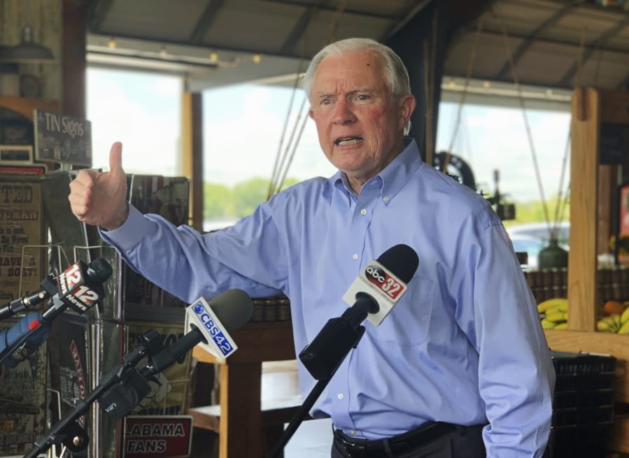 Former U.S. Attorney General Jeff Sessions speaks to reporters during a campaign stop at Sweet Creek restaurant and farmers market, south of Montgomery, Ala., Monday, July 6, 2020. Sessions faces former Auburn University football Coach Tommy Tuberville in the July 14 Republican runoff. Sessions held the seat for 20 years before resigning to become President Donald Trump&#039;s first attorney general.