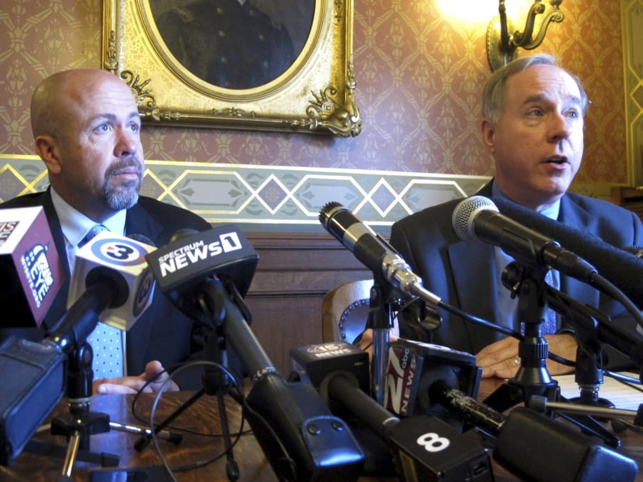 FILE - In this May 15, 2019 file photo, Wisconsin Republican Assembly Speaker Robin Vos, right, and Majority Leader Jim Steineke, left, speak in Madison, Wis. Wisconsin&#039;s Republican Assembly leaders are breaking with President Donald Trump over possibly delaying the Nov. 3, 2020 presidential election. Speaker Vos and Majority Leader Steineke tweeted Thursday, July 30, 2020, that they oppose delaying the election, a date that is enshrined in federal law and would require an act of Congress to change, including agreement from the Democratic-controlled House of Representatives.