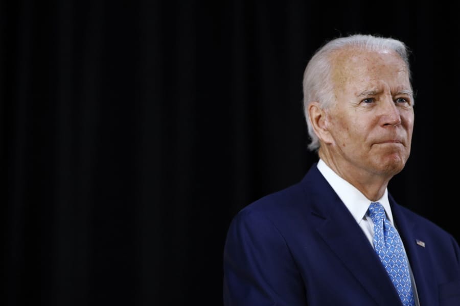 FILE - In this June 30, 2020, file photo Democratic presidential candidate, former Vice President Joe Biden speaks at Alexis Dupont High School in Wilmington, Del.