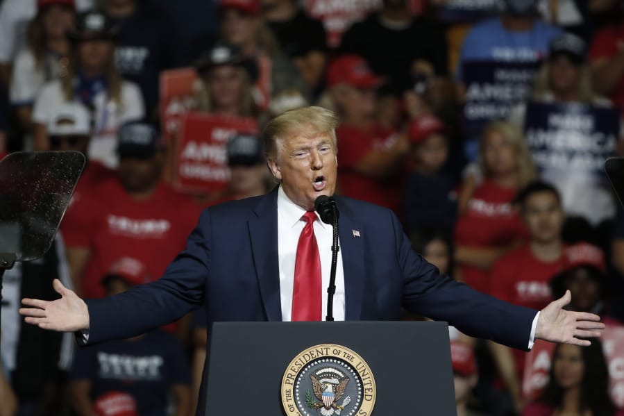 FILE - In this June 20, 2020, file photo, President Donald Trump speaks during a campaign rally in Tulsa, Okla. Trump&#039;s reelection bid will take baby steps back out onto the road in the coming days after a multi-week hiatus that came amid a massive surge in coronavirus cases across much of the nation and after the debacle of his planned comeback in Oklahoma.