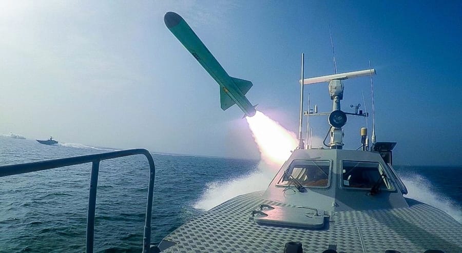 In this photo released Tuesday, July 28, 2020, by Sepahnews, a Revolutionary Guard&#039;s speed boat fires a missile during a military exercise. Iranian commandos also fast-roped down from a helicopter onto a replica of an aircraft carrier in the exercise called &quot;Great Prophet 14.&quot; The drill appears aimed at threatening the U.S. amid tensions between Tehran and Washington.