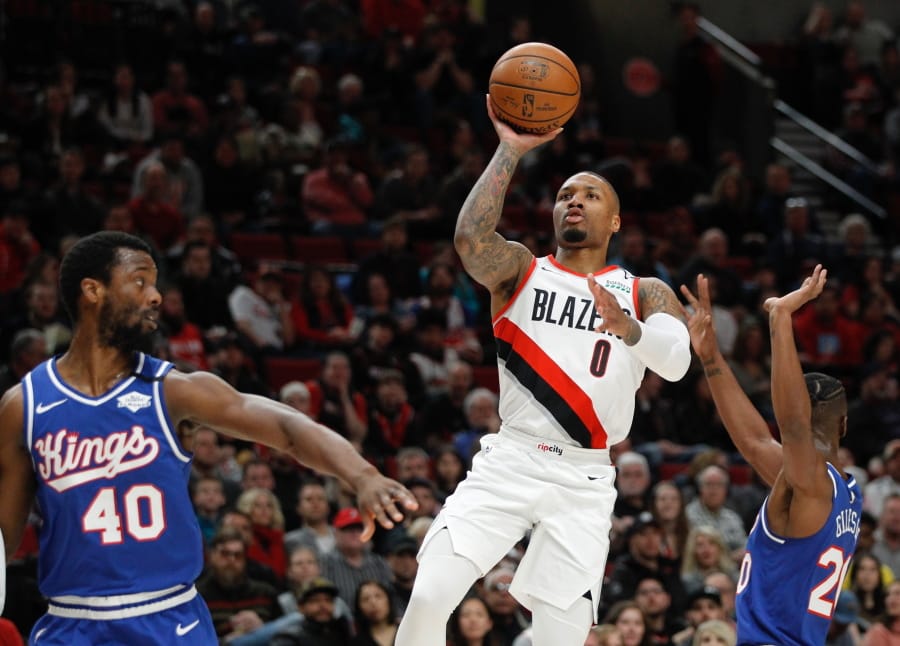 Portland Trail Blazers guard Damian Lillard (0) says he will spend most of his downtime working on recording music while inside the NBA bubble.