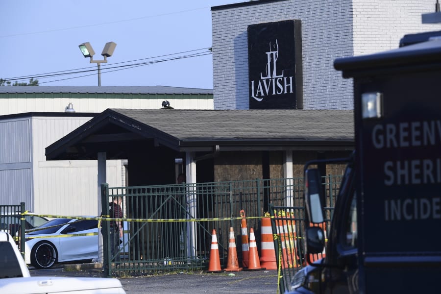 CORRECTS THE SOURCE TO KEN RUINARD WITH THE GREENVILLE NEWS - Yellow police tape can be seen outside of the Lavish Lounge in Greenville, S.C., Sunday, July 5, 2020, following a deadly shooting.