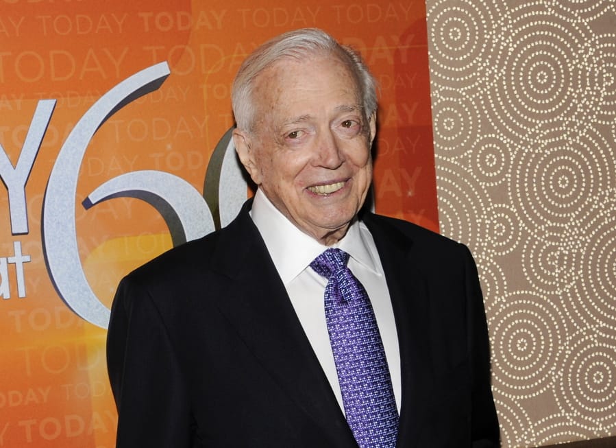 FILE - This Jan. 12, 2012 file photo shows Hugh Downs at the &quot;Today&quot; show 60th anniversary celebration in New York. Downs, a genial and near-constant presence on television from the 1950s through the 1990s, has died. His family said Downs died of natural causes Wednesday, July 1, 2020, in Scottsdale, Ariz. He was 99.