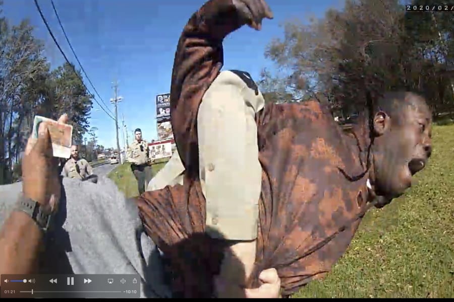 In this still image from body camera video released by the Valdosta police, Antonio Arnelo Smith is slammed face-first to the ground by a Valdosta police sergeant, in Valdosta, Ga., on Feb. 8, 2020. The video shows Smith handing his driver&#039;s license to a police officer and answering questions cooperatively before a second officer, Sgt. Billy Wheeler, approaches him from behind, wraps him in a bear hug and slams him face-first to the ground. Smith is crying in pain when he&#039;s told there&#039;s a warrant for his arrest. Officers are then told the warrant was for someone else.