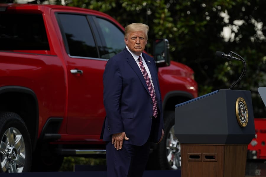 President Donald Trump pauses as he speaks during an event on regulatory reform on the South Lawn of the White House, Thursday, July 16, 2020, in Washington.
