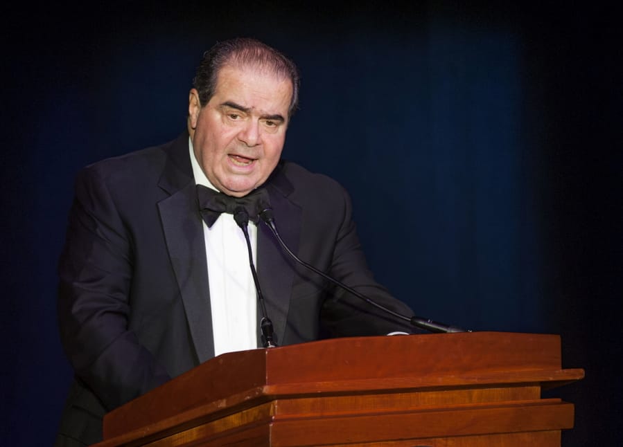 FILE - In this Nov. 6, 2014, file photo Supreme Court Justice Antonin Scalia speaks in Washington. President Donald Trump has visions of establishing by the final months of his second term--should he win one--a &quot;National Garden of American Heroes&quot; that will pay tribute to some of the prominent figures in the nation&#039;s history, including Justice Scalia, that he sees as the &quot;greatest Americans to ever live.&quot; The president unveiled his plan Friday, July 3, 2020, during his speech at Mount Rushmore National Memorial, S.D.