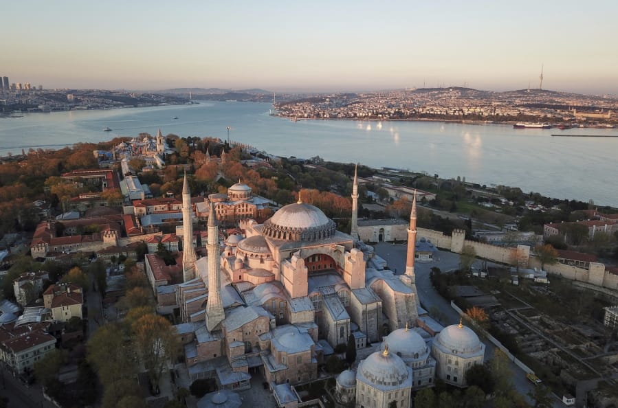 An aerial view of the Byzantine-era Hagia Sophia, one of Istanbul&#039;s main tourist attractions in the historic Sultanahmet district of Istanbul, Saturday, April 25, 2020. The 6th-century building is now at the center of a heated debate between conservative groups who want it to be reconverted into a mosque and those who believe the World Heritage site should remain a museum.