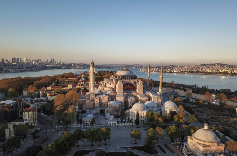 FILE-In this Saturday, April 25, 2020 file photo, an aerial view of the Byzantine-era Hagia Sophia, one of Istanbul&#039;s main tourist attractions in the historic Sultanahmet district of Istanbul.Turkey&#039;s Council of State on Friday, July 10, 2020, threw its weight behind a petition brought by a religious group and annulled a 1934 cabinet decision that changed the 6th century building into a museum. The ruling allows the government to restore the Hagia Sophia&#039;s previous status as a mosque.The decision was in line with the Turkish President&#039;s Recep Tayyip Erdogan&#039;s calls to turn the hugely symbolic world heritage site into a mosque despite widespread international criticism, including from the United States and Orthodox Christian leaders.