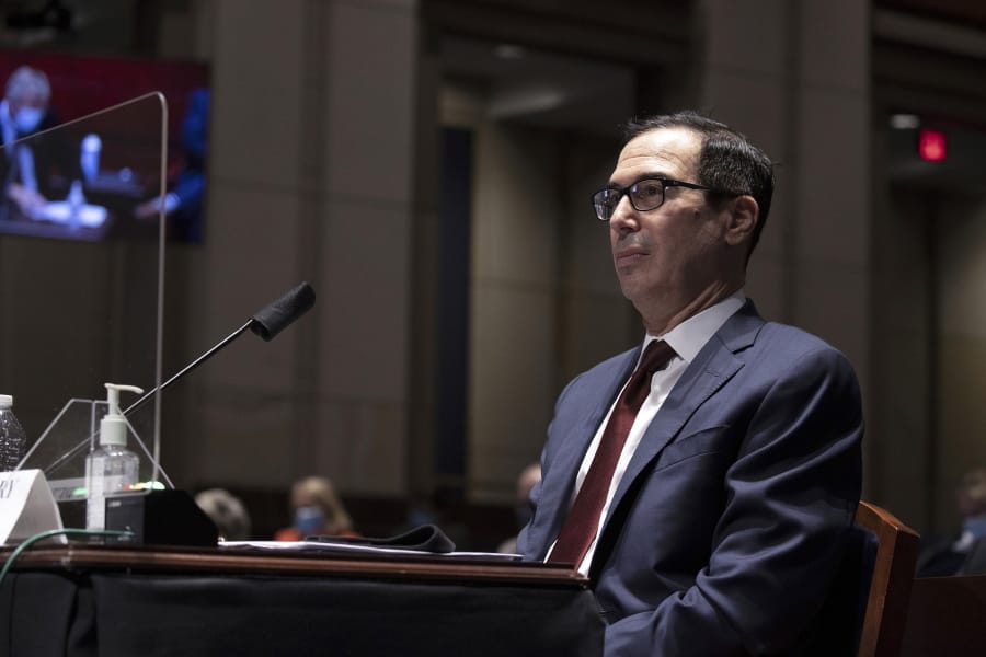 FILE - In this June 30, 2020 file photo, Treasury Secretary Steven Mnuchin testifies during a House Financial Services Committee hearing on the coronavirus response on Capitol Hill in Washington.
