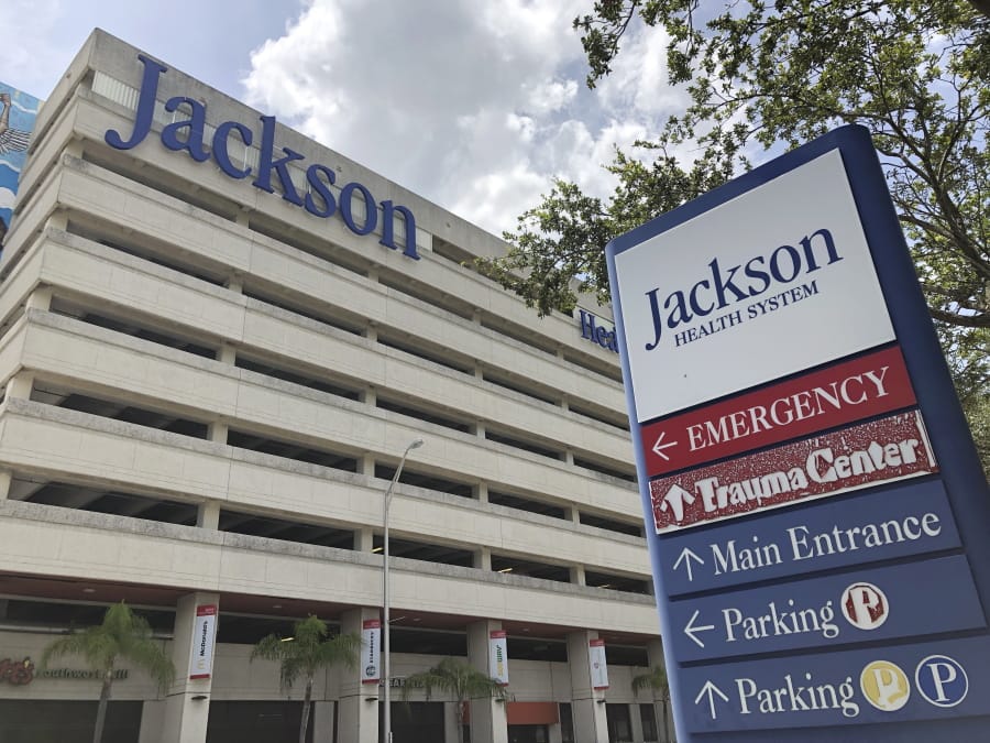 An entrance at Jackson Memorial Hospital is shown, Thursday, July 9, 2020, in Miami. Florida reported on Thursday the biggest 24-hour jump in hospitalizations, with more than 400 patients being admitted.