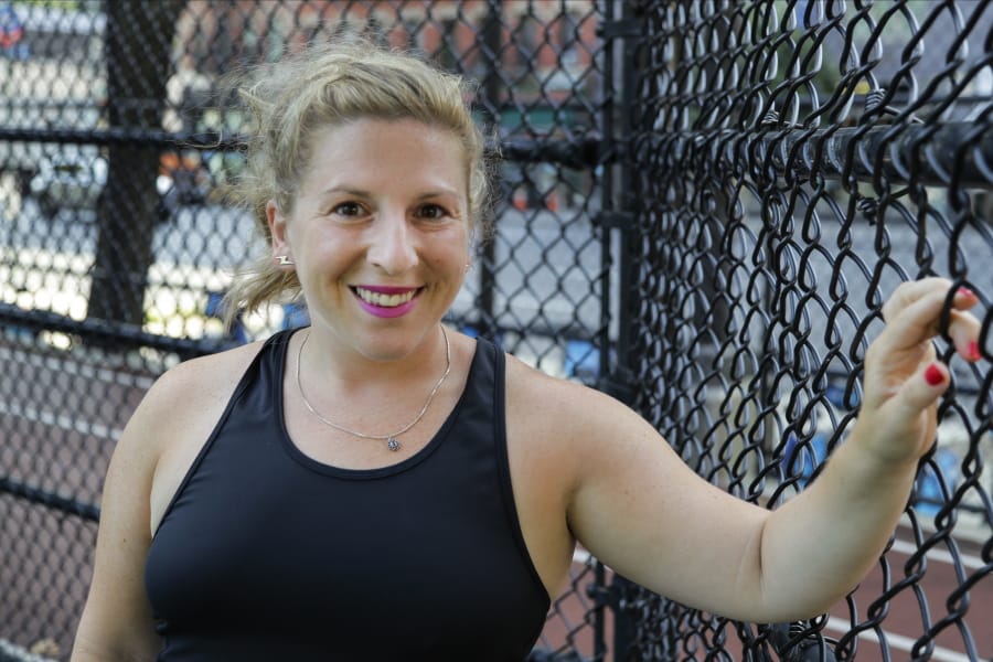 Lauren Wire, a 32-year-old publicist who lives in Manhattan, poses for a portrait before a fitness class Wednesday, July 15, 2020, in New York. Many Americans are changing clothing sizes depending on how they spent their time sheltering at home. Wire gained back 12 of the 50 pounds she lost leading up to the pandemic because she was ordering in a lot from restaurants and partaking in social distance cocktails with friends. She says she bought new shorts and swimwear when she gained the weight but now she&#039;s starting to shed pounds again by biking outside.