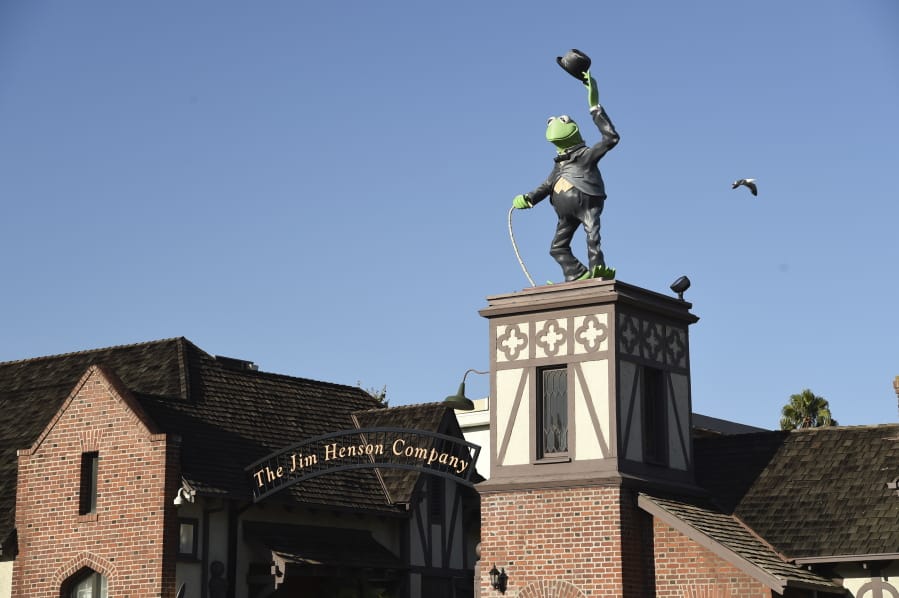 A statue of Kermit The Frog stands at the entrance to The Jim Henson Company, Tuesday, July 7, 2020, in the Hollywood section of Los Angeles. The U.S. government&#039;s small business lending program sent pandemic relief money into unexpected corners of the entertainment industry. The Muppet makers say they received about $2 million to keep their 75 workers employed through the coronavirus shutdown.