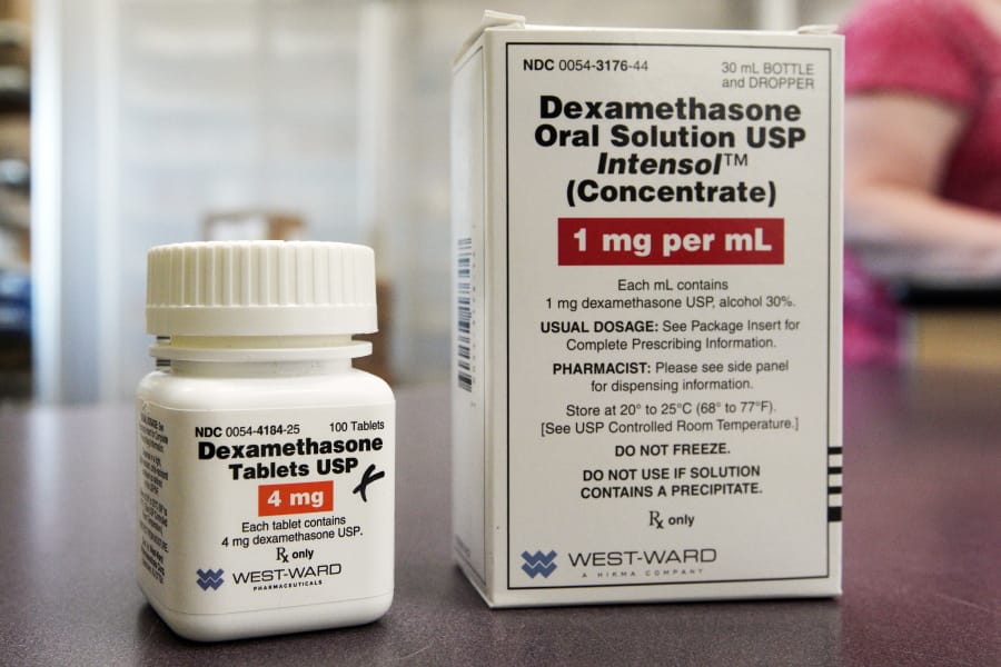 FILE - This Tuesday, June 16, 2020 file photo shows a bottle and box for dexamethasone in a pharmacy in Omaha, Neb. On Friday, July 17, 2020, British researchers published a report on the only drug shown to improve survival -- the inexpensive steroid dexamethasone. Two other studies found that the malaria drug hydroxychloroquine does not help people with only mild coronavirus symptoms.