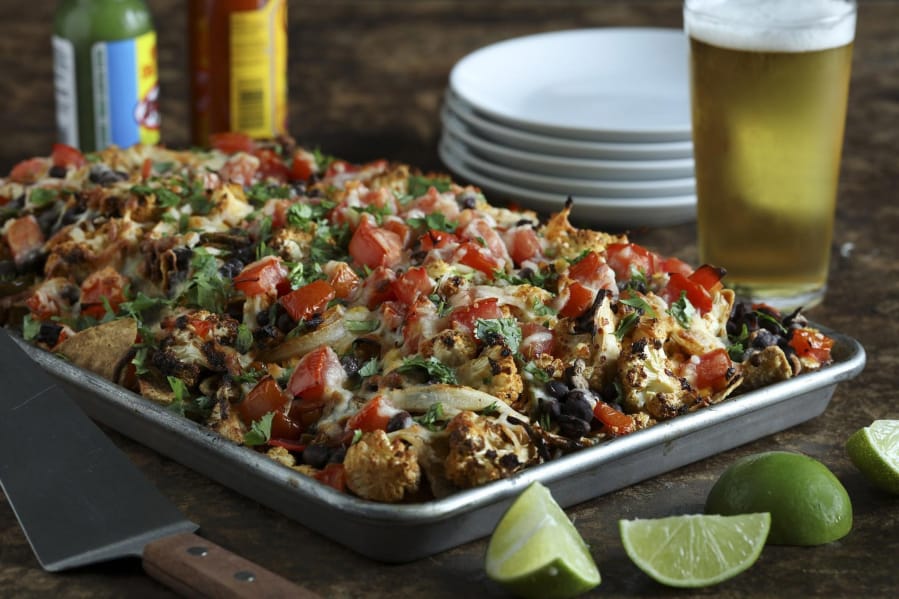Roasted cauliflower becomes the star for a twist on nachos. It&#039;s still decadent with plenty of melted cheese, but also somewhat healthier than standard nachos.