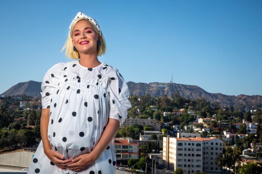 Nine months pregnant international pop star Katy Perry is photographed on the rooftop of Capitol Records, in Hollywood, Calif., on July 29 in promotion of her new album &quot;Smile,&quot; due out in August. This is Perry&#039;s sixth studio album. (Jay L.