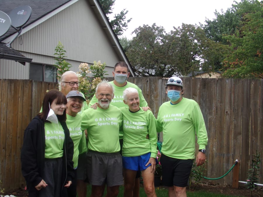 Participants in the G&amp;L (Greenwood and Lindell) Family triathlon and run/walk pose with their T-shirts. Front row from left, Cleo Greenwood, Susan Ford, Mike Greenwood, Kathy Murphy and Kevin Greenwood. Back row, Bob Ford and Rian Lindell.