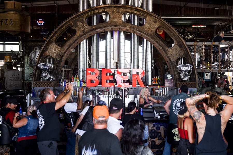 People watch a concert at the Full Throttle Saloon during the 80th Annual Sturgis Motorcycle Rally in Sturgis, South Dakota on AUg. 9, 2020.