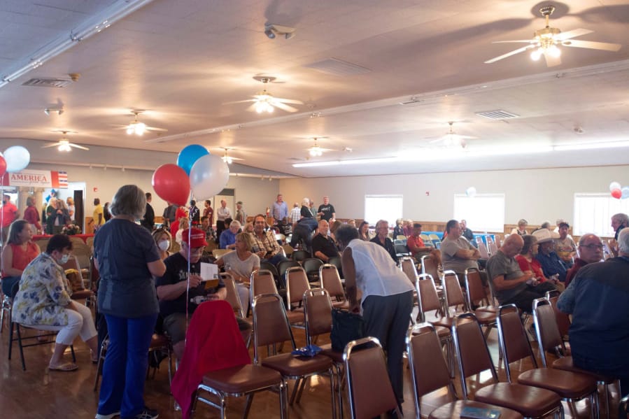 Attendees gather at a meet-and-greet event for Republican candidates at the former Clark County Square Dance Center in Brush Prairie Tuesday, Aug. 25. Around 100 people attended.