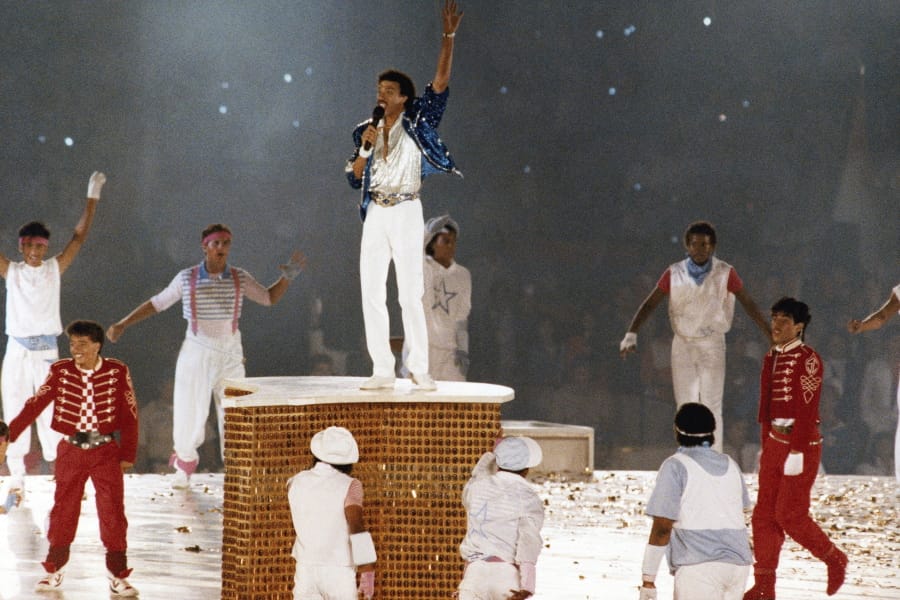 Singer Lionel Ritchie performs Aug. 12, 1984, during the closing ceremony of the Summer Olympic Games in Los Angeles.