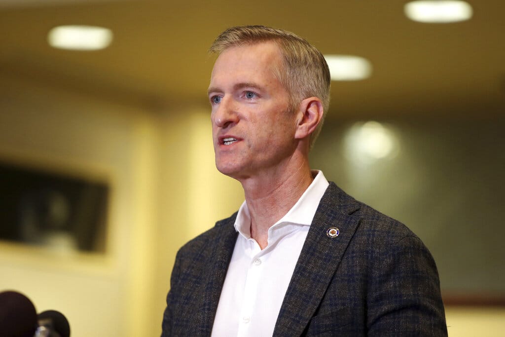 Portland Mayor Ted Wheeler calls for an end to violence in the city during a news conference Sunday, Aug. 30, 2020, a day after a demonstrator was shot and killed in downtown Portland on Saturday.