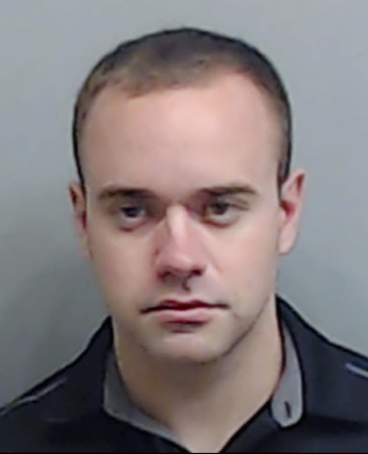 In this booking photo made available Thursday, June 18, 2020 by the Fulton County, Ga., Sheriff&#039;s Office, shows Atlanta Police Officer Garrett Rolfe. Rolfe, who fatally shot Rayshard Brooks in the back after the fleeing man pointed a stun gun in his direction, was charged with felony murder and 10 other charges. Rolfe was fired after the shooting.