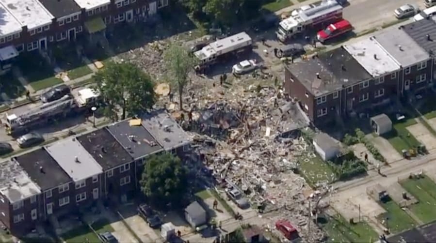 This photo provided by WJLA-TV shows the scene of an explosion in Baltimore on Monday, Aug. 10, 2020. Baltimore firefighters say an explosion has leveled several homes in the city.