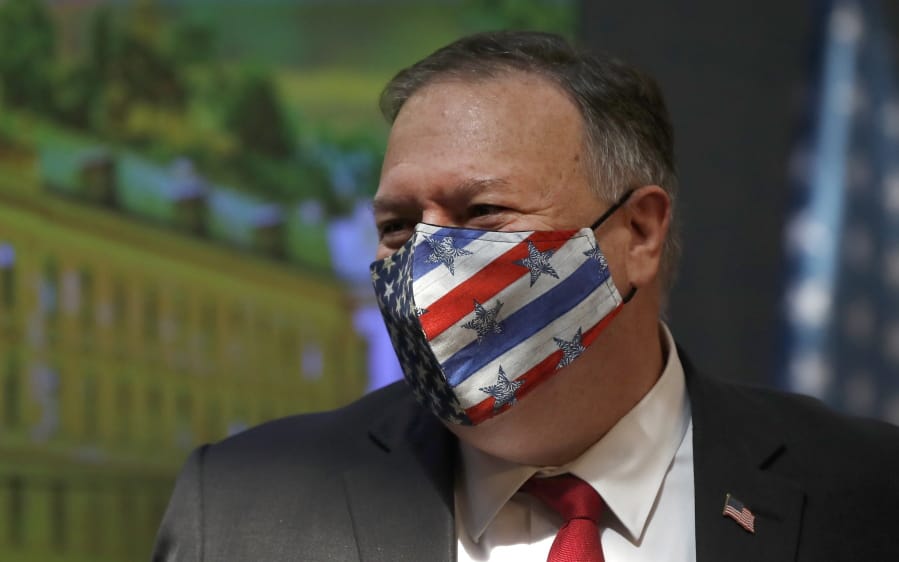U.S. Secretary of State Mike Pompeo wears a face mask during a joint press conference as part of a meeting with the Prime Minister of Czech Republic Andrej Babis in Prague, Czech Republic, Wednesday, Aug. 12, 2020. U.S. Secretary of State Mike Pompeo is in Czech Republic at the start of a four-nation tour of Europe. Slovenia, Austria and Poland are the other stations of the trip.