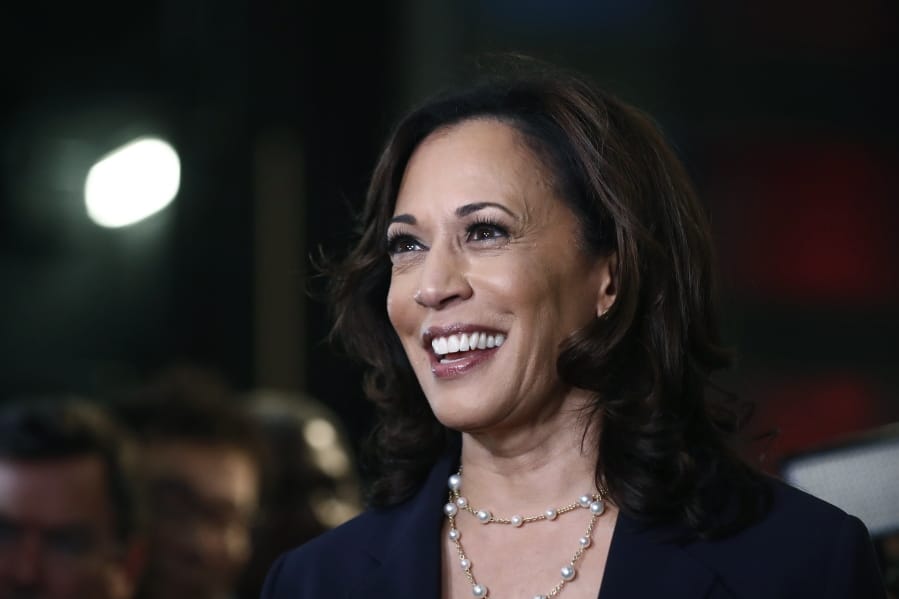 FILE - In this June 27, 2019, file photo, then-Democratic presidential candidate Sen. Kamala Harris, D-Calif., listens to questions after the Democratic primary debate hosted by NBC News at the Adrienne Arsht Center for the Performing Art in Miami.