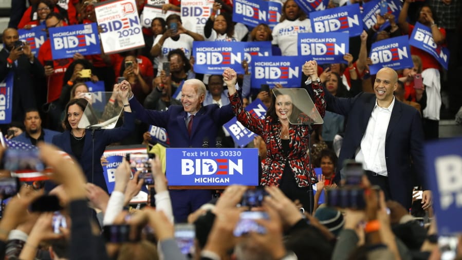 FILE - In this March 9, 2020, file photo, Sen. Kamala Harris, D-Calif., from left, Democratic presidential candidate former Vice President Joe Biden, Michigan Gov. Gretchen Whitmer, and Sen. Cory Booker D-N.J. greet the crowd during a campaign rally in Detroit. Whitmer&#039;s quick ascension to the national stage &#039;Ai and on Biden&#039;s list of potential running mates &#039;Ai has left Democrats both thankful she will continue to lead Michigan after he chose Kamala Harris but also excited about what the governor&#039;s future may hold.