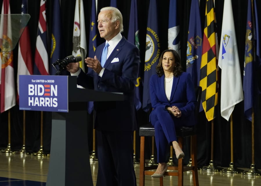 Democratic presidential candidate former Vice President Joe Biden, joined by his running mate Sen. Kamala Harris, D-Calif., speaks during a campaign event at Alexis Dupont High School in Wilmington, Del., Wednesday, Aug. 12, 2020.