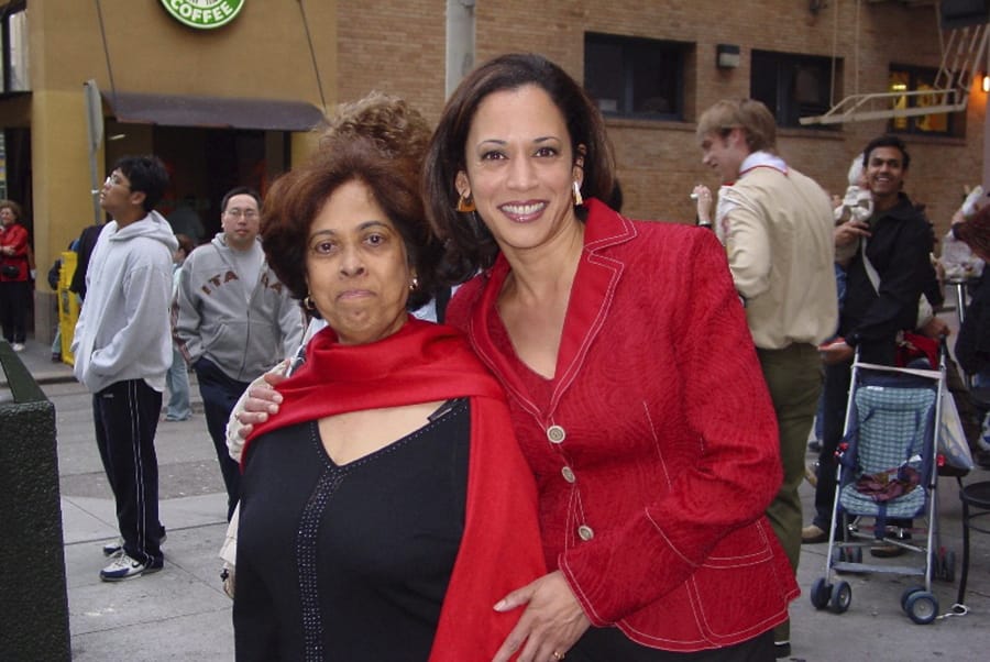 This 2007 photo provided by the Kamala Harris campaign shows her with her mother, Shyamala, at a Chinese New Year parade.