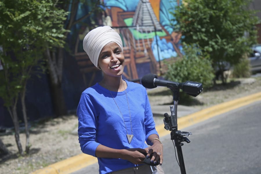 Democrat Rep. Ilhan Omar addresses media after lunch at the Mercado Central in Minneapolis Tuesday, Aug. 11, 2020, primary Election Day in Minnesota.