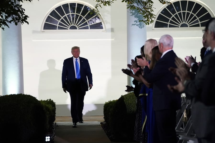 President Donald Trump arrives to listen to first lady Melania Trump speak during the 2020 Republican National Convention from the Rose Garden of the White House, Tuesday, Aug. 25, 2020, in Washington.