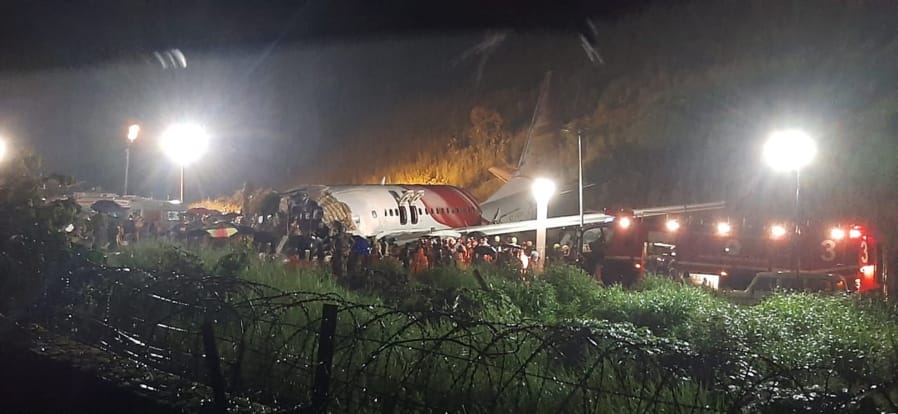 An Air India Express flight skidded off a runway while landing Friday in Kozhikode, India.