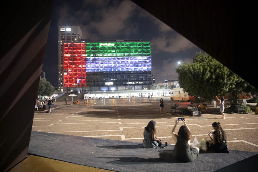 FILE - In this Thursday, Aug. 13, 2020, file photo, the Tel Aviv City Hall is lit up with the flag of the United Arab Emirates as Israel and the UAE announced they would be establishing full diplomatic ties, in Tel Aviv, Israel. Secret talks and quiet ties -- that&#039;s what paved the way for last week&#039;s deal between the United Arab Emirates and Israel to normalize relations. Touted by President Donald Trump as a major Mideast breakthrough, the agreement was in fact the culmination of more than a decade of quiet links rooted in frenzied opposition to Iran that predated Trump and even Barack Obama, as well as Trump&#039;s avowed goal to undo his predecessor&#039;s Mideast legacy.