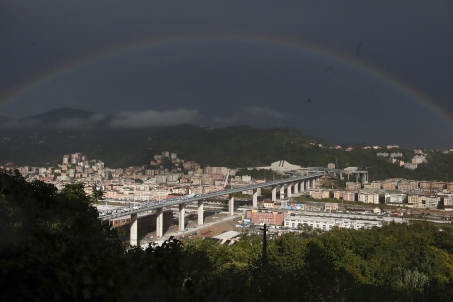 A rainbow shines over the new San Giorgio Bridge in Genoa, Italy, Monday, Aug. 3, 2020. Two years ago this month, a stretch of roadbed collapsed on Genoa&#039;s Morandi Bridge, sending cars and trucks plunging to dry riverbed below and ending 43 lives. On Monday, Italy&#039;s president journeys to Genoa for a ceremony to inaugurate a replacement bridge.