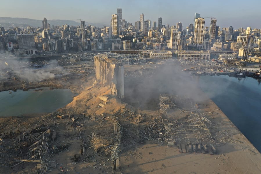 A drone picture shows the scene of an explosion at the seaport of Beirut, Lebanon, Wednesday, Aug. 5, 2020. A massive explosion rocked Beirut on Tuesday, flattening much of the city&#039;s port, damaging buildings across the capital and sending a giant mushroom cloud into the sky. More than 70 people were killed and 3,000 injured, with bodies buried in the rubble, officials said.