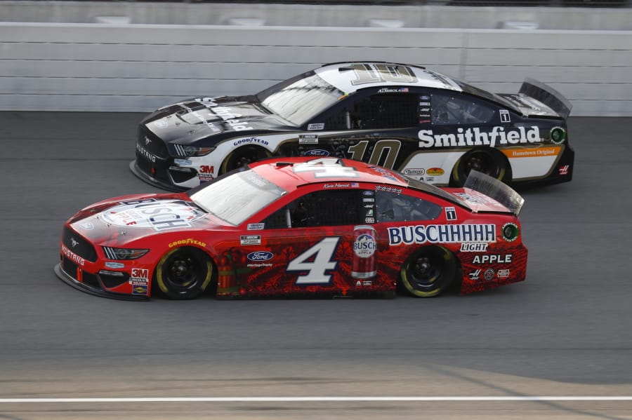 Kevin Harvick (4) races Aric Almirola (10) during the NASCAR Cup Series auto race at Michigan International Speedway in Brooklyn, Mich., Sunday, Aug. 9, 2020.