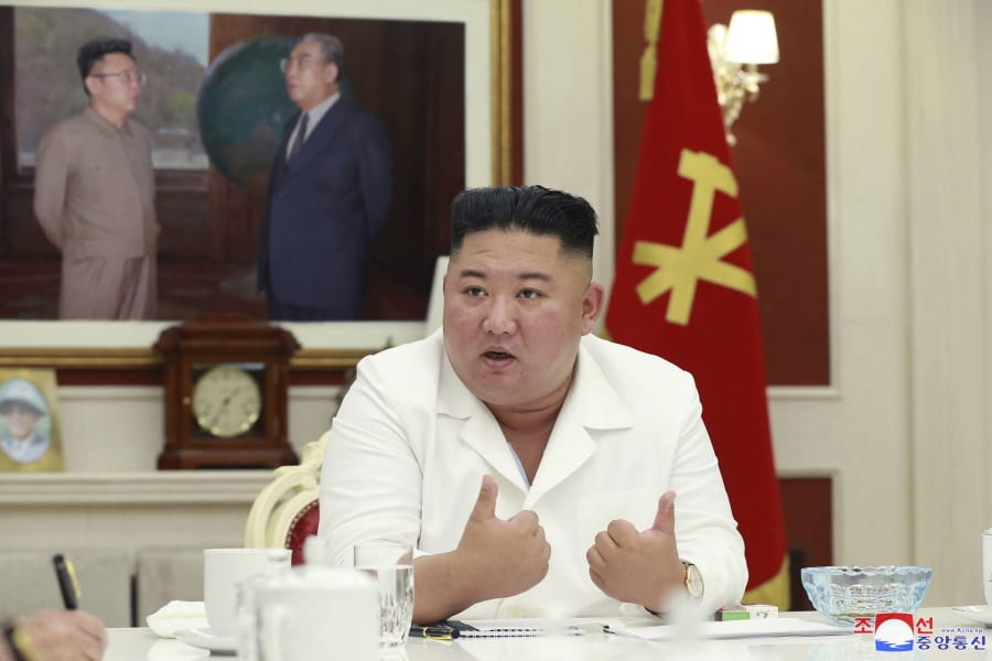 In this photo provided by the North Korean government, North Korean leader Kim Jong Un, presides over an executive policy council meeting at the ruling Workers&#039; Party in Pyongyang, North Korea, Wednesday, Aug. 5, 2020. Kim Jong Un directed his government agencies to act immediately to stabilize the livelihoods of residents in a city locked down over coronavirus concerns, state media reported Thursday, Aug. 6, 2020. Independent journalists were not given access to cover the event depicted in this image distributed by the North Korean government. The content of this image is as provided and cannot be independently verified. Korean language watermark on image as provided by source reads: &quot;KCNA&quot; which is the abbreviation for Korean Central News Agency.