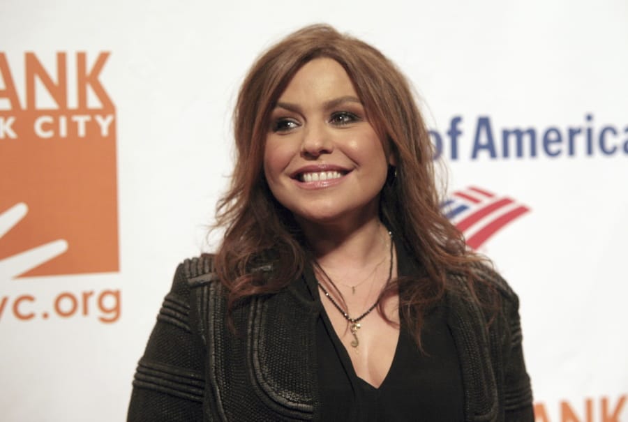 FILE - In this April 9, 2014 file photo, Rachel Ray attends the Food Bank of NYC Can Do Awards Benefit Gala on in New York.  Authorities say a massive fire engulfed Ray&#039;s New York home. The Warren County sheriff said there were no injuries during the Sunday, Aug. 9, 2020 evening fire at her home in Lake Luzerne.