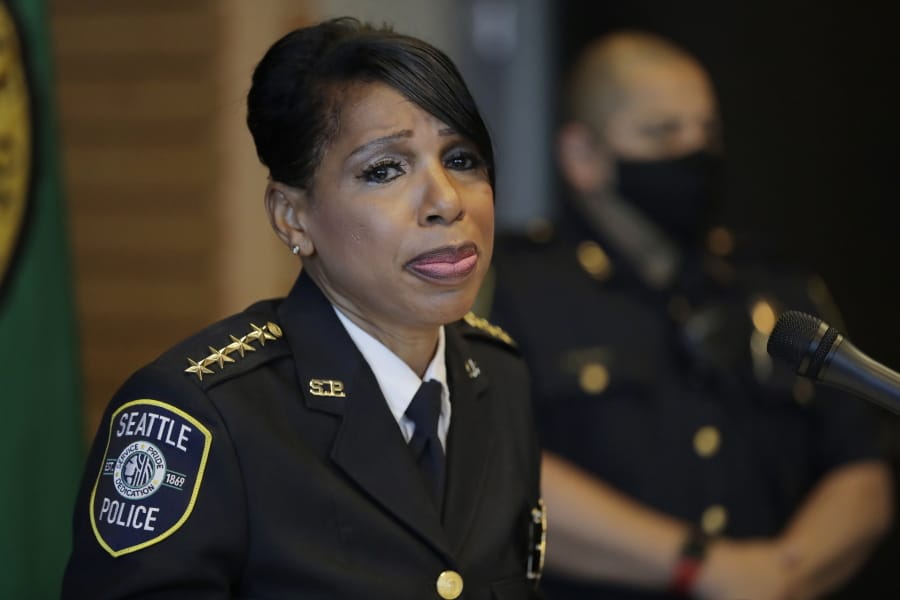 Seattle Police Chief Carmen Best pauses as she speaks during a news conference, Tuesday, Aug. 11, 2020, in Seattle. Best, the first Black woman to lead Seattle&#039;s police department, announced she will be stepping down in September following cuts to her budget that would reduce the department by as many as 100 officers. (AP Photo/Ted S.