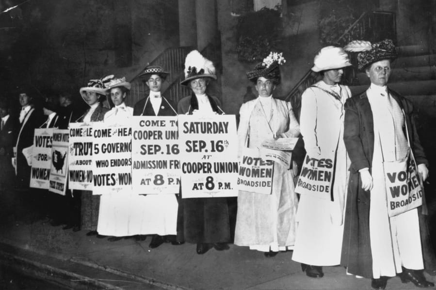 FILE - In this September 1916 file photo, demonstrators hold a rally for women&#039;s suffrage in New York. The Seneca Falls convention in 1848 is widely viewed as the launch of the women&#039;s suffrage movement, yet women didn&#039;t gain the right to vote until ratification of the 19th Amendment in 1920.