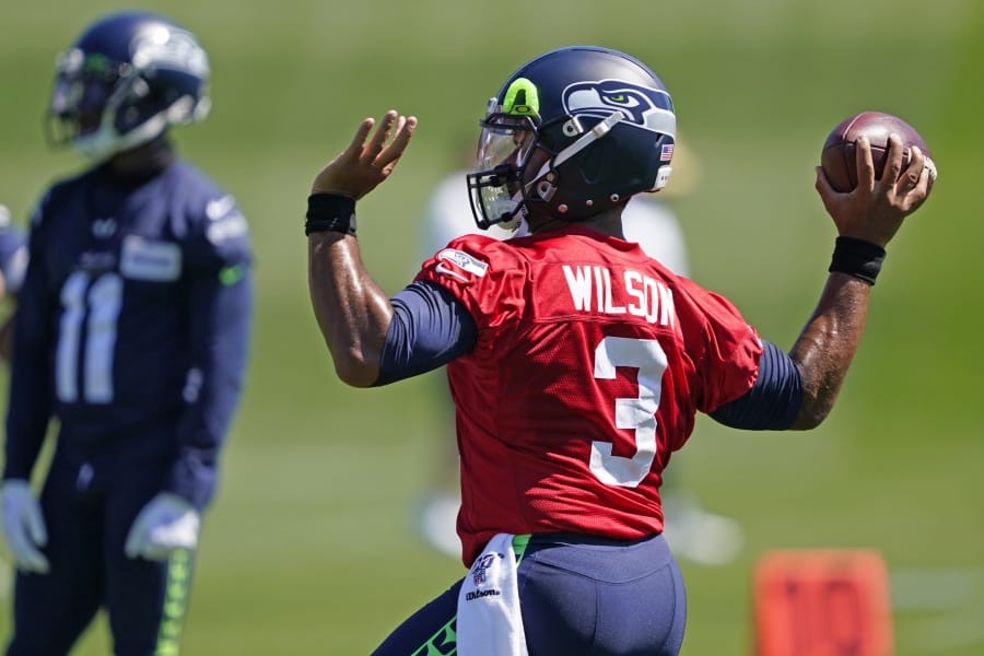 Seattle Seahawks quarterback Russell Wilson passes during NFL football training camp, Friday, Aug. 14, 2020, in Renton, Wash. (AP Photo/Ted S. Warren, Pool) (Ted S.
