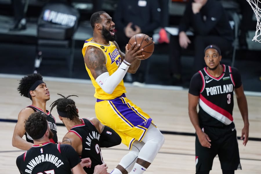 Los Angeles Lakers&#039; LeBron James (23) scores against the Portland Trail Blazers during the second half of an NBA basketball first round playoff game Saturday, Aug. 29, 2020, in Lake Buena Vista, Fla. The Lakers won 131-122 to win the series 4-1.
